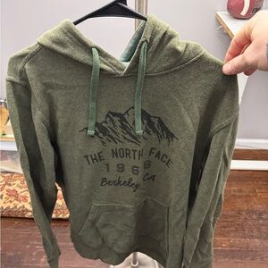 The North Face Olive Green Hoodie with Mountain Graphic